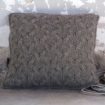 Kussen met kabelpatroon