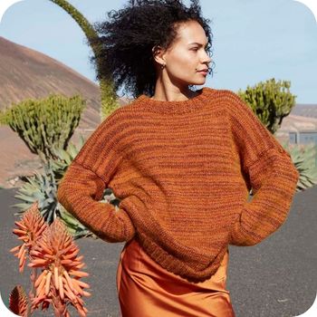 Oranje trui met een glimmertje