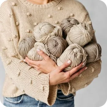 Gebreide trui en bollen garen