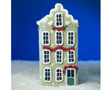 Kerstdorp haken het Groene grachtenpand - Mr. Cey haakpakket | hobbygigant.nl