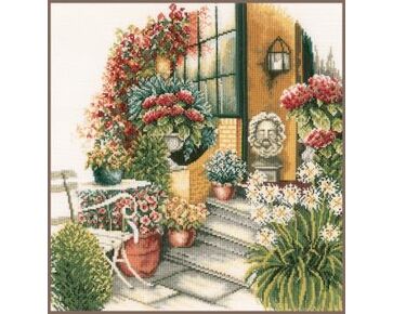 Terras in herfstbloei borduurpakket - LanArte telpatroon | HobbyGigant