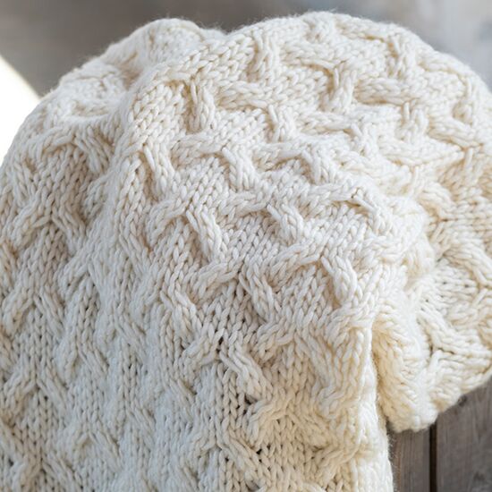 Woondeken met kabelpatroon breien FairMade breipakket | hobbygigant.nl